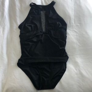 Ruched one piece bathing suit with mesh cut out